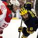 Michigan freshman center Justin Selman prepares to take a face-off in the game against Miami on Saturday, March 23. Daniel Brenner I AnnArbor.com